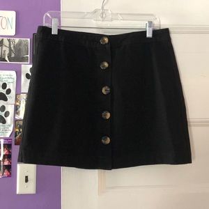 Black jean mini skirt.